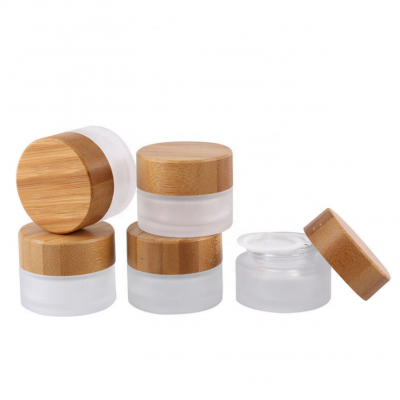 Cosmetic 30ml 50ml 100ml clear frosted glass jar with bamboo wood lid for body cream