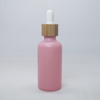 Luxury cosmetic oil packaging 10ml 20ml 30ml 50ml 100ml glass dropper bottle pink bottles with bamboo caps