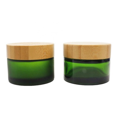 Cosmetic empty round wholesale bamboo green frosted glass cosmetic jar 50g 100g