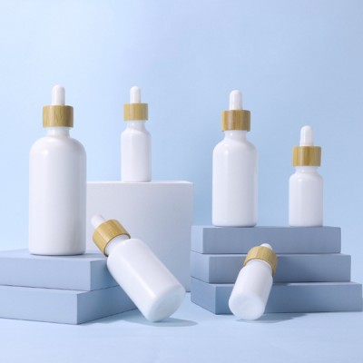 10ml 20ml 30ml 50ml 100ml body oil hair care packaging white porcelain glass dropper bottle with bamboo lid